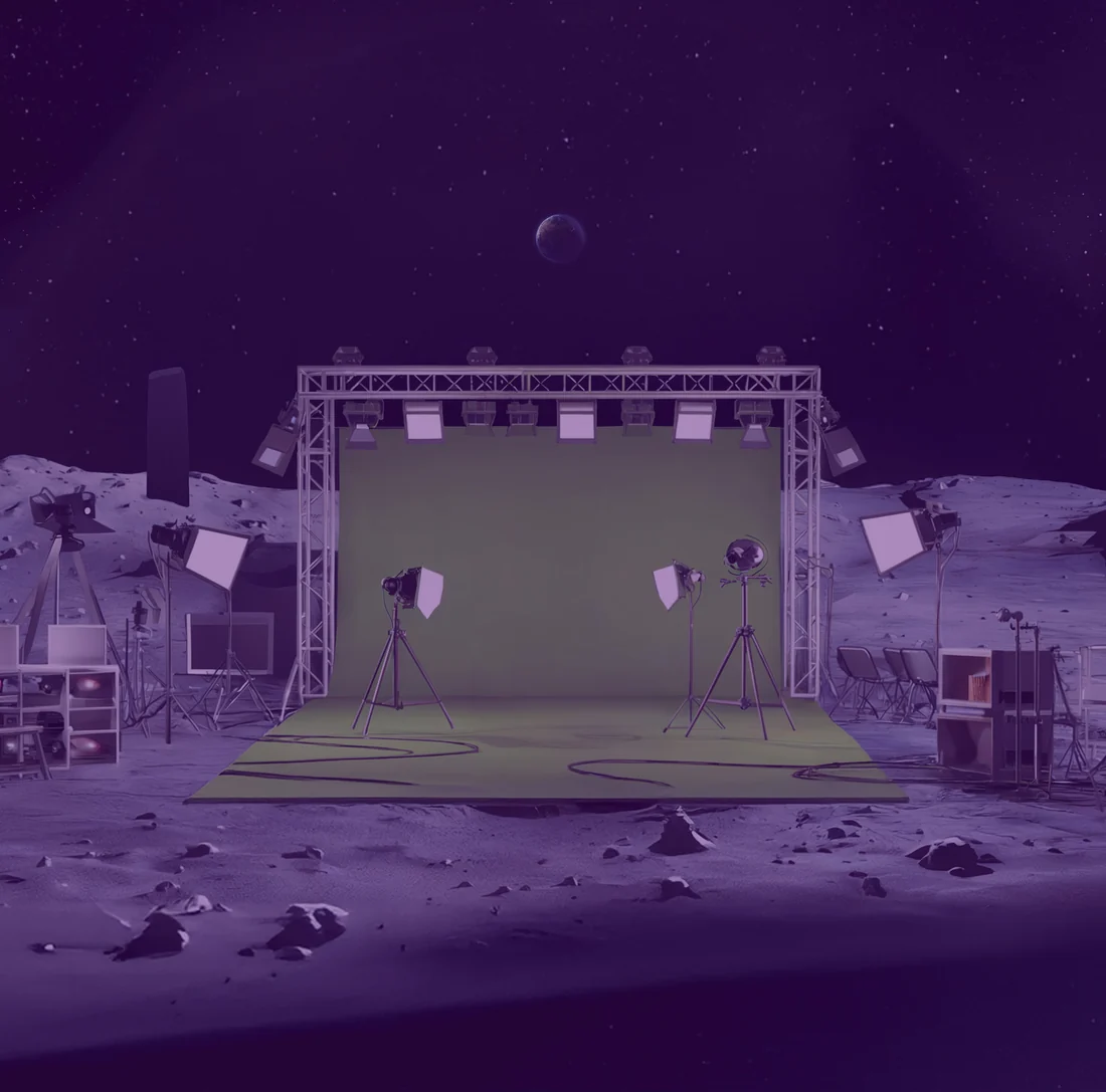 The original package insert: a film set on the moon, with a backdrop, studio lights, cameras, lunar terrain, and Earth above the horizon.